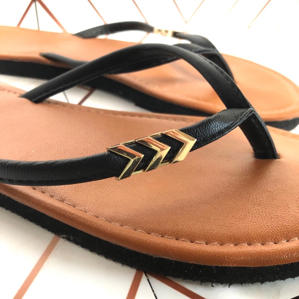 Leather flip flops with gold chevron detail